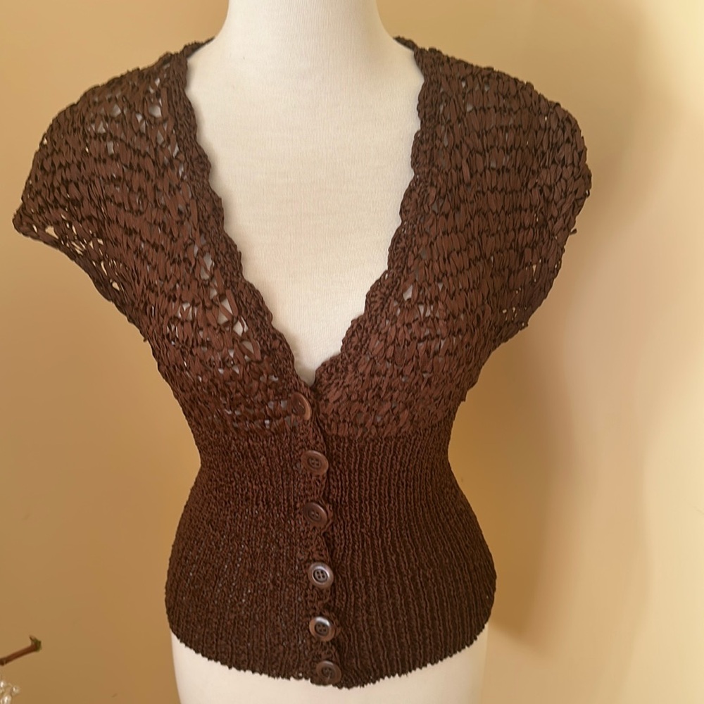 Bebe knitted sleeveless vest.